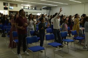 People Praying Together in Gathering